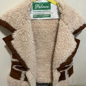 Fleece-lined suede Western style vest.